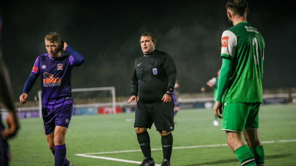 Referee in action
