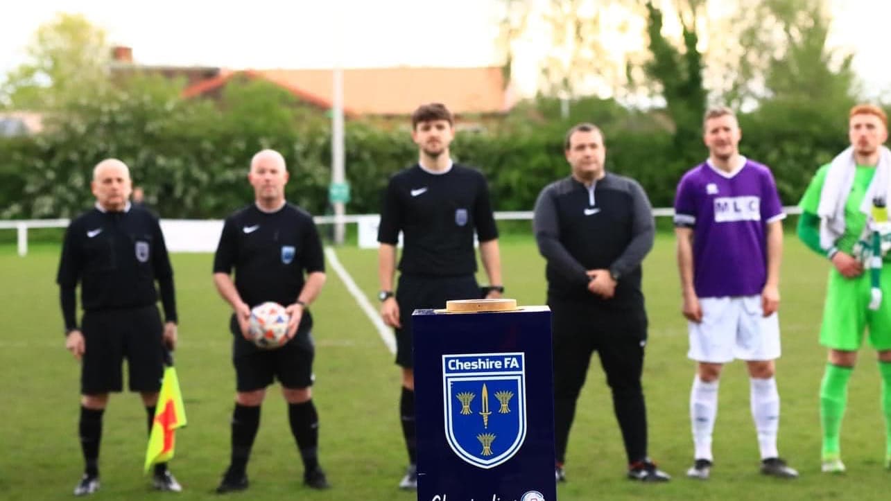 Chester match officials lined up before a cup fixture